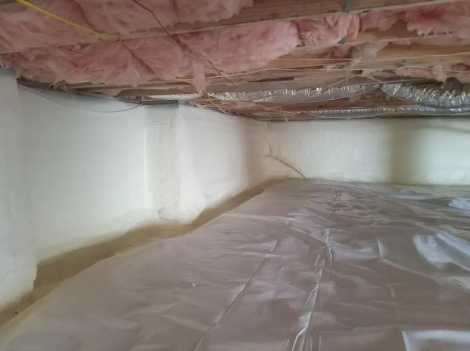 Crawl space encapsulation with closed-cell spray foam for Commercial Roof Restoration in Camp Springs